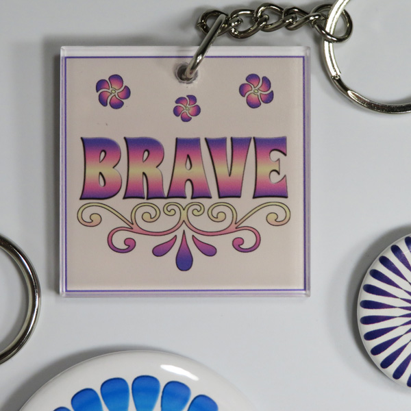 Keychain with "Brave" affirmation design
